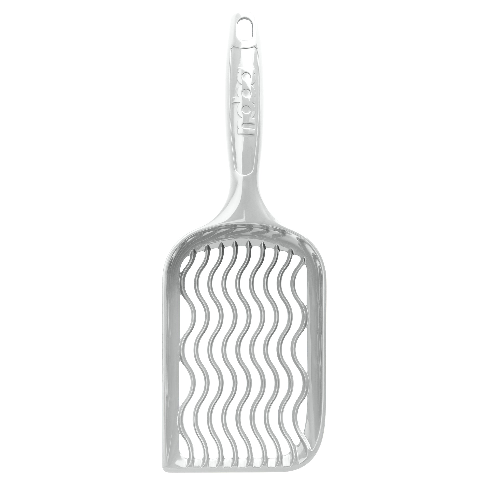 Metallic pet grooming tool with wavy design on a white background