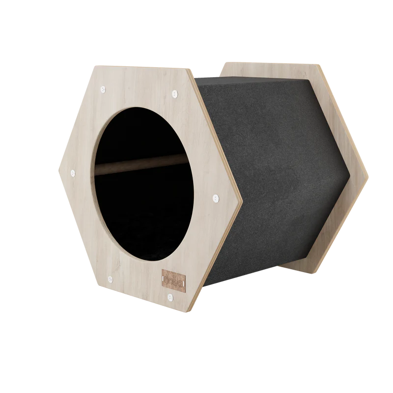 Hexagonal pet bed with a dark interior on a white background