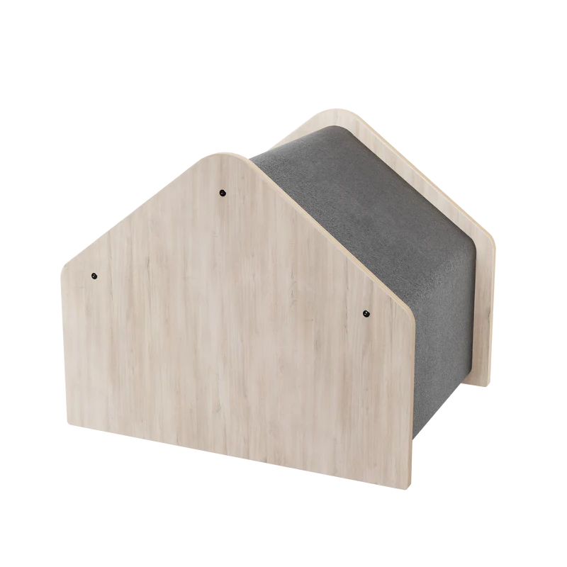 Wooden pet house with gray cushion on a white background