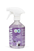 Purple spray bottle with white nozzle on a white background