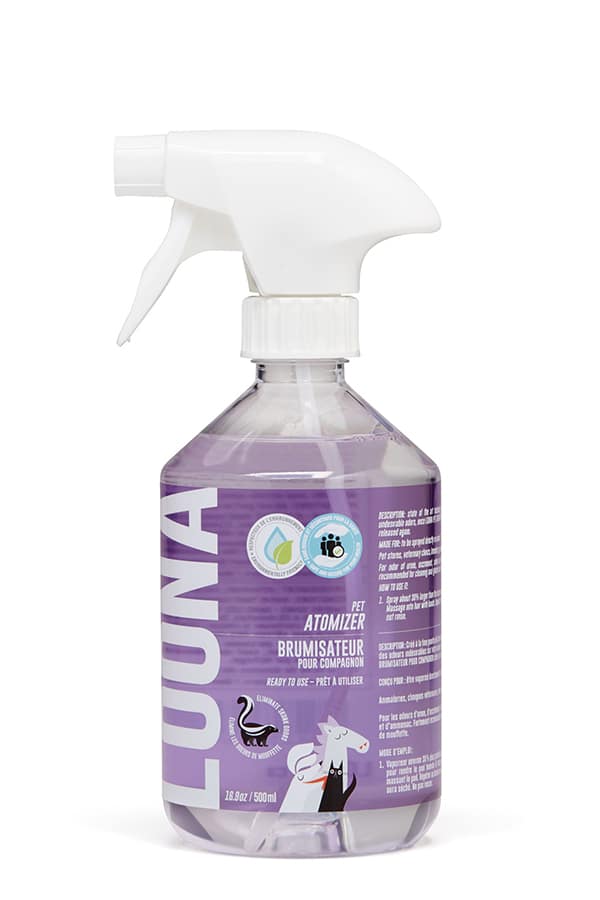 Purple spray bottle with white nozzle on a white background