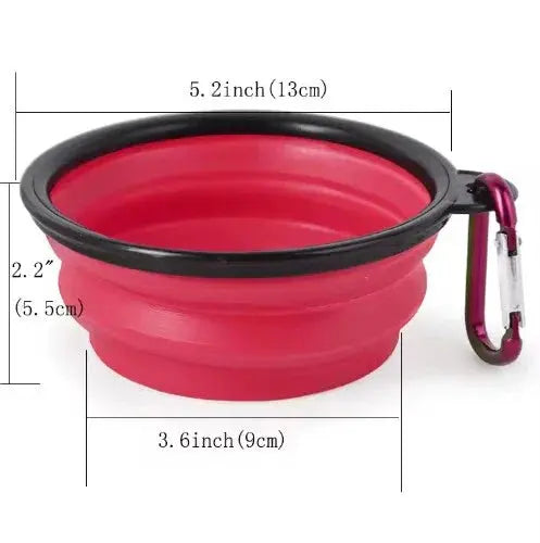 Red collapsible dog bowl with black rim and carabiner on a white background, showing measurements.