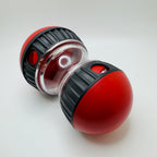 Red and black slow feeding toy for cats and dogs with a clear center on a white background