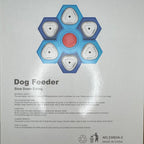 Dog feeder packaging with blue and white design on a gray background