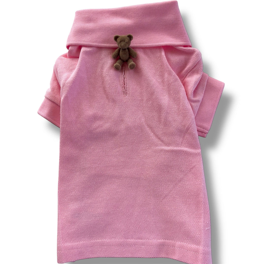 Pink dog shirt with a teddy bear on a white background