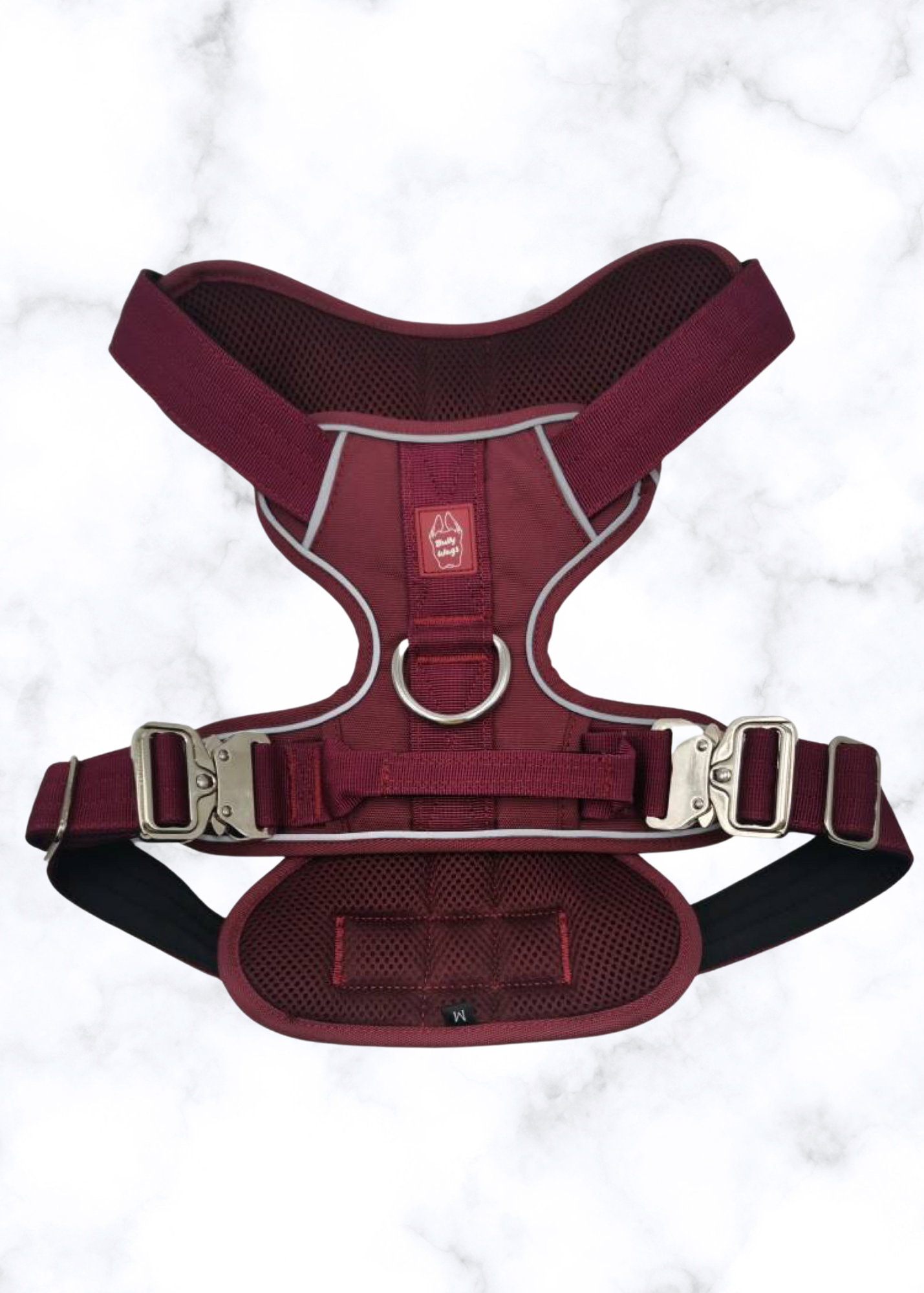 Red dog harness on a white background