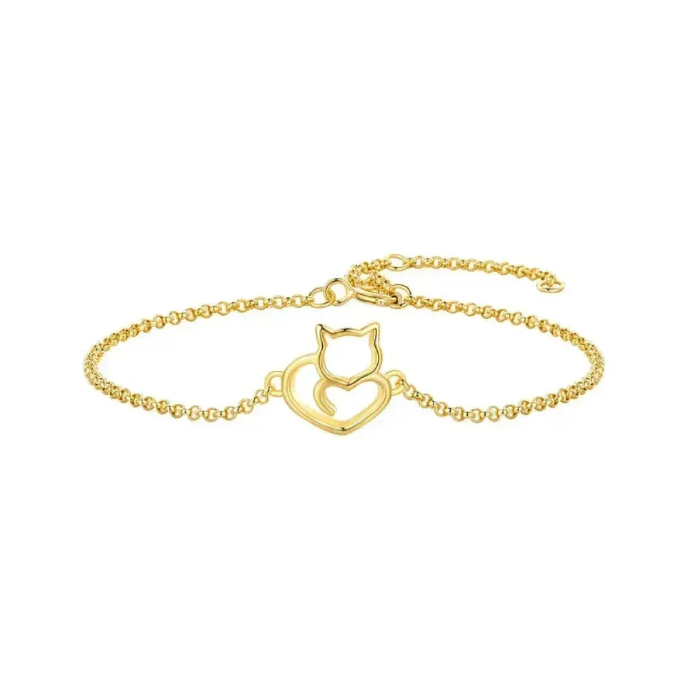 Gold bracelet with a cat-shaped charm on a white background