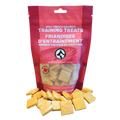 Red package of Wild Pacific Salmon Training Treats with yellow treats on a white background