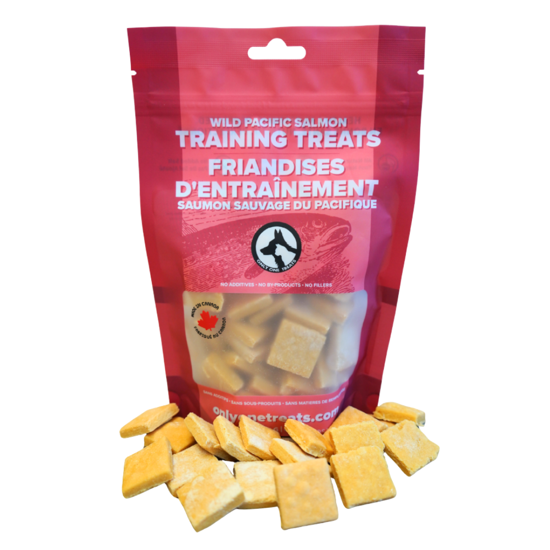 Red package of Wild Pacific Salmon Training Treats with yellow treats on a white background