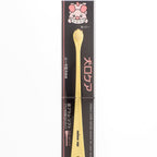 Dog toothbrush with packaging featuring a cartoon dog face on a white background