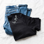 Black t-shirt with 'Far Mom' text on a white background