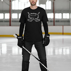 Person wearing a black t-shirt with  hockey and my dog graphic on an ice rink