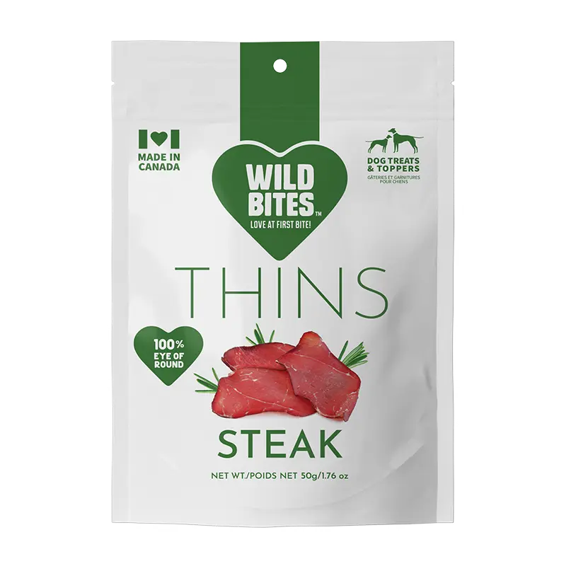 Package of Wild Bites Thins Steak dog treats on a white background