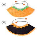 Two pumpkin-themed pet collars, one orange with green trim and the other black with orange trim, on a white background.