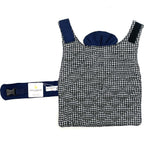 Black and white patterned dog rain coat with blue accents on a white background