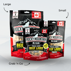 Three packages of Rocky Mountain Raw Freeze-Dried Beef Liver Treats in large and small sizes on a light gray background.