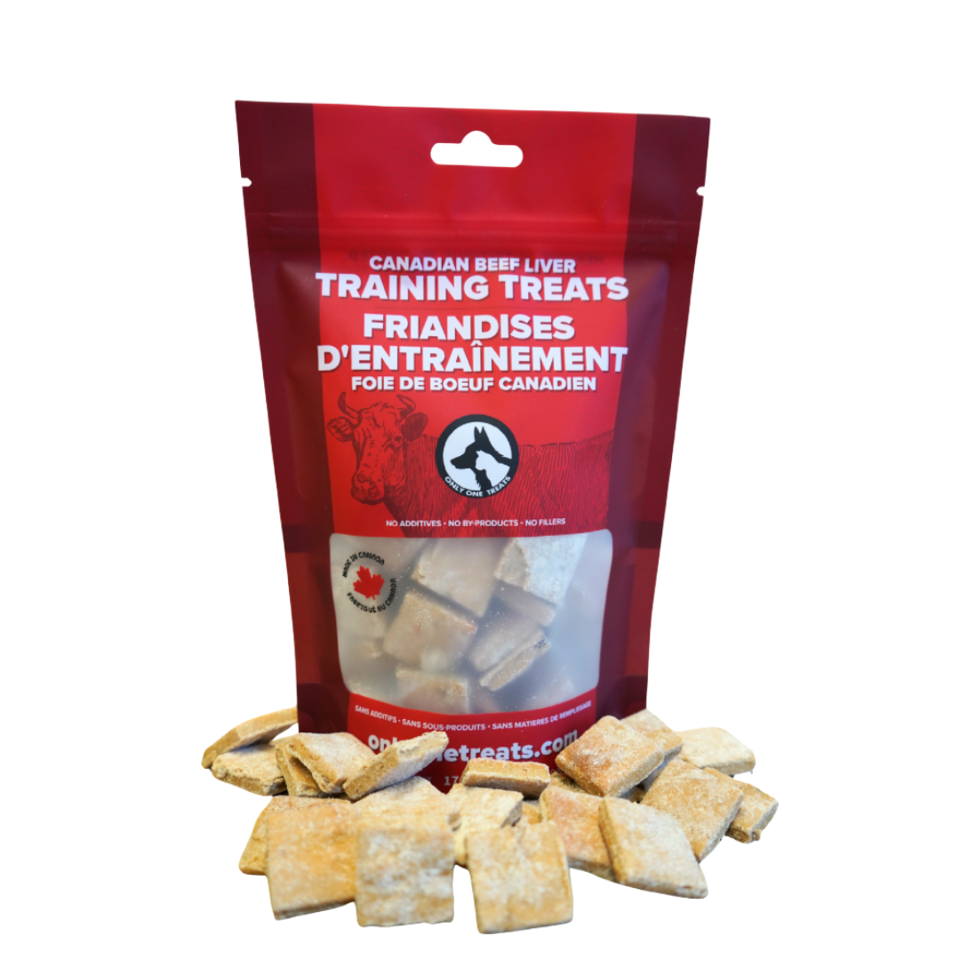 Red package of Canadian beef liver training treats with treats displayed in front on a white background