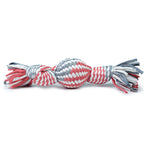 Dog toy with red, white, and gray pattern on a white background