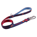 Dog leash with Superman logo and text on a white background
