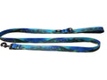 Blue and green mountain-patterned dog leash on a white background