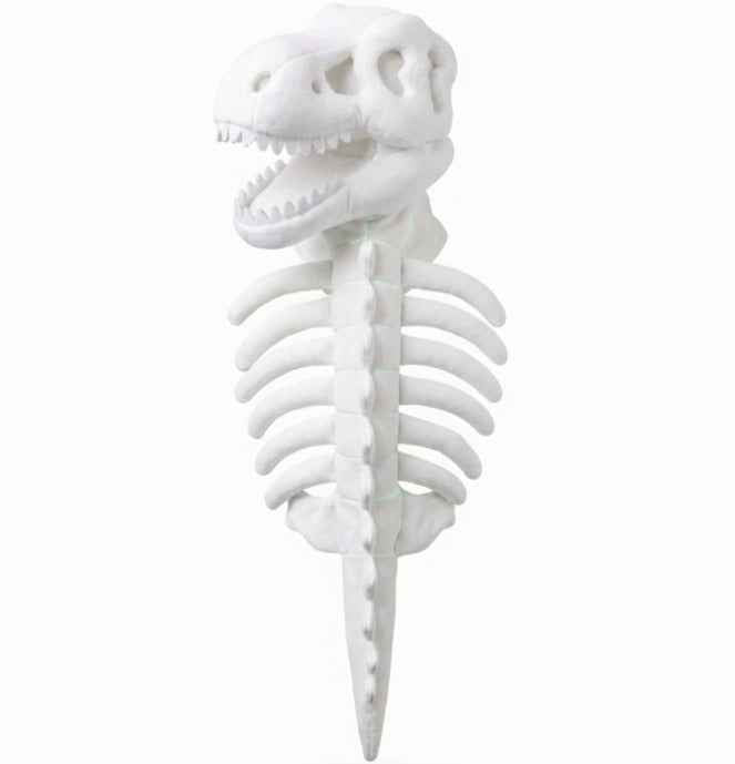 A white dinosaur skeleton model, featuring a detailed skull with open jaws, a rib cage, and a long spine, shown against a plain white background.