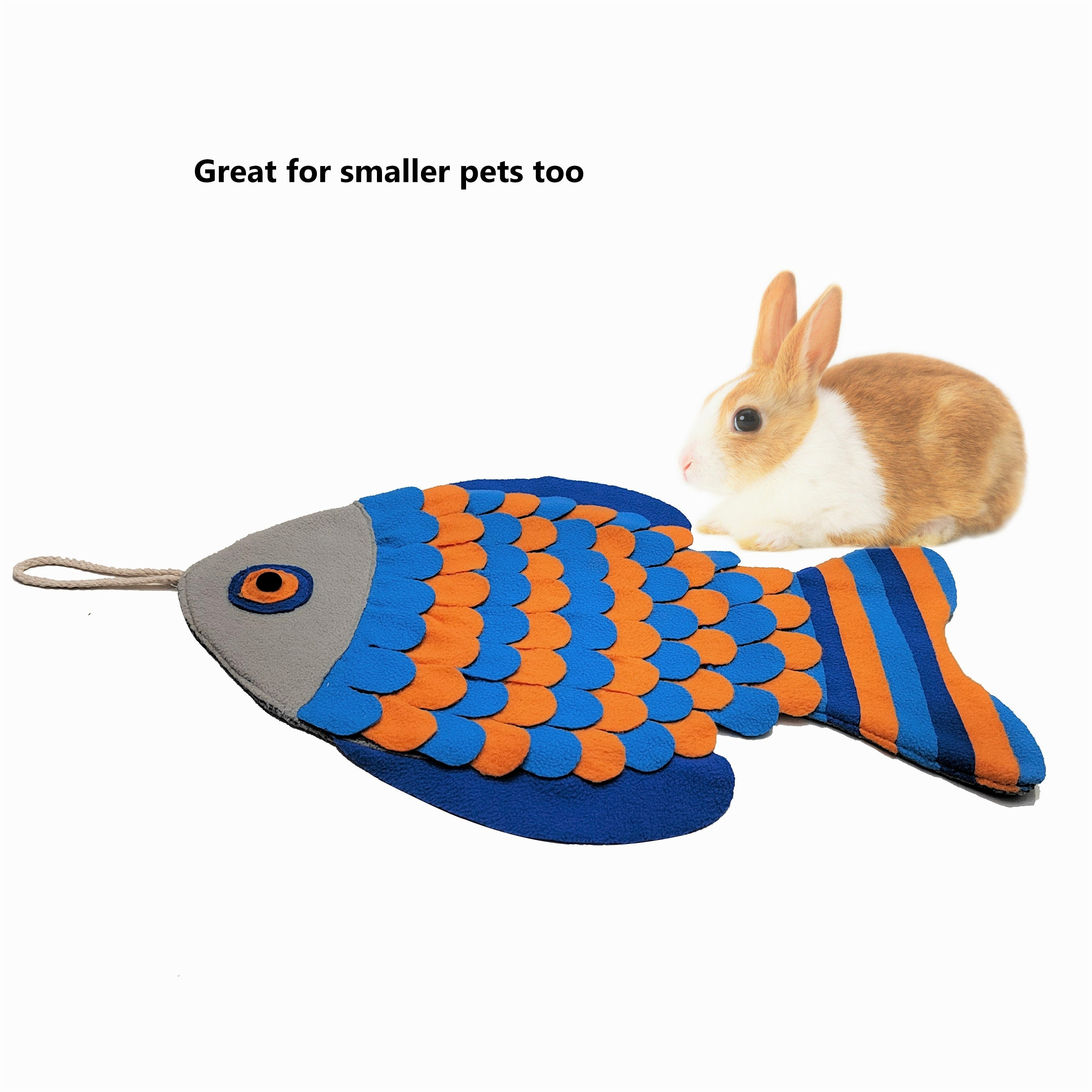 Fish-shaped pet snuffle mat with rabbit on a white background
