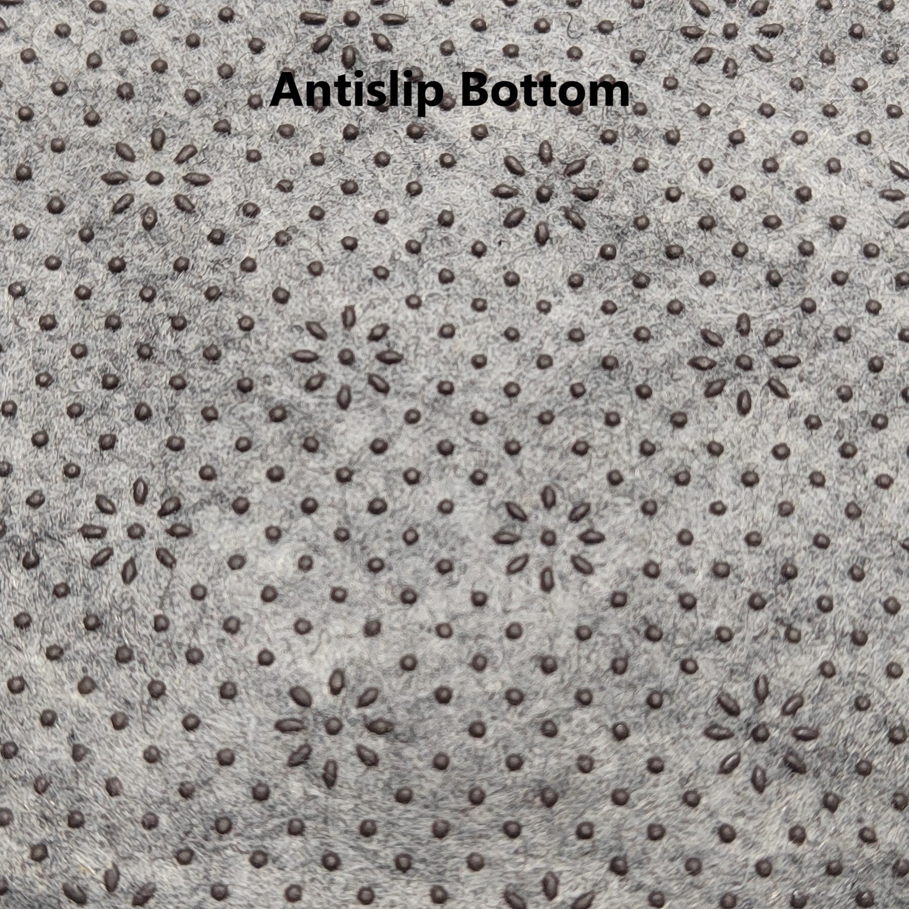 Textured surface with 'Antislip Bottom' text