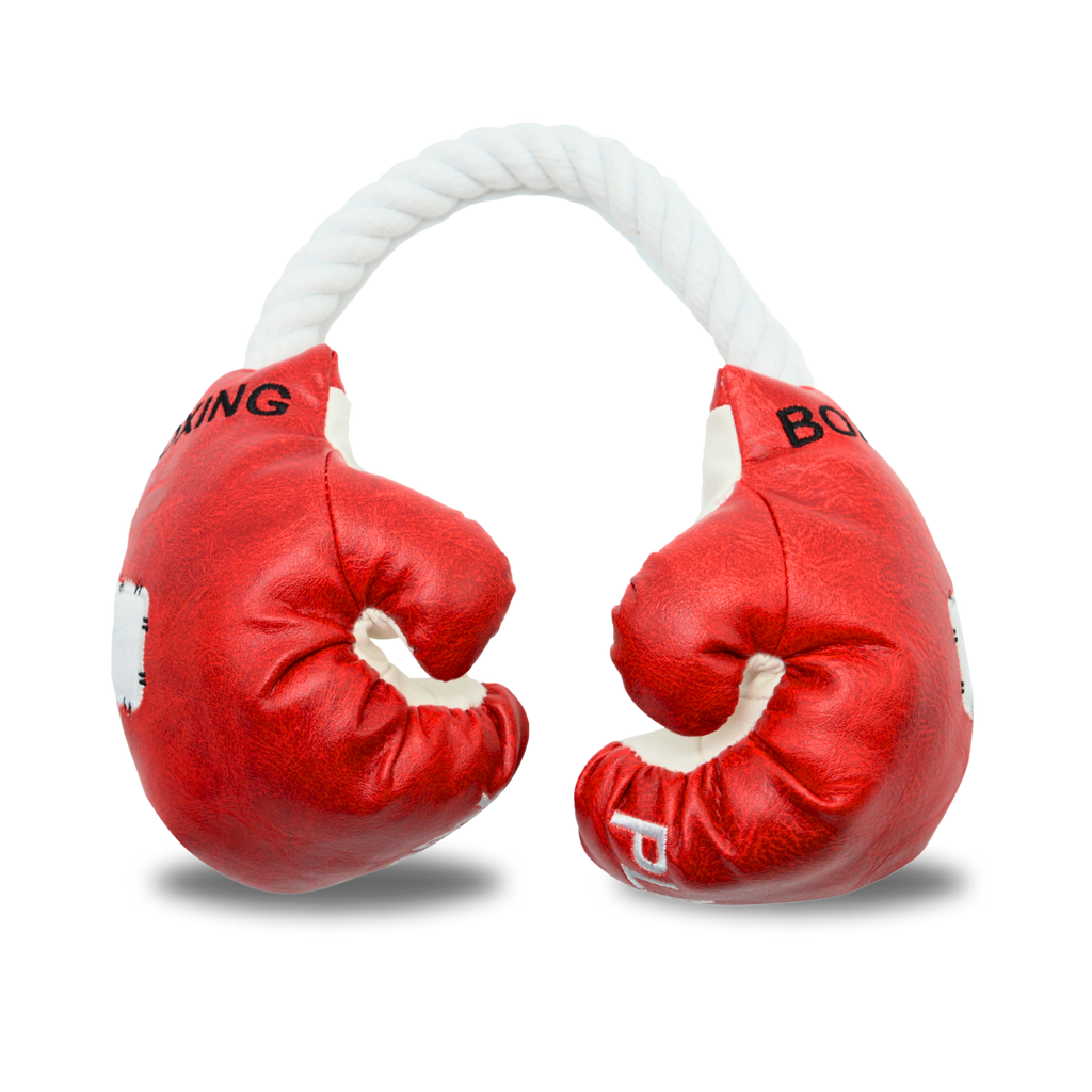 Dog toy Red boxing gloves with white rope handles on a white background