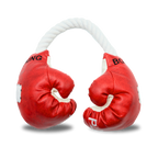Dog toy Red boxing gloves with white rope handles on a white background