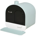 Pet litter box with black front and light green exterior on a white background