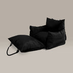 Black pet car seat on a beige background