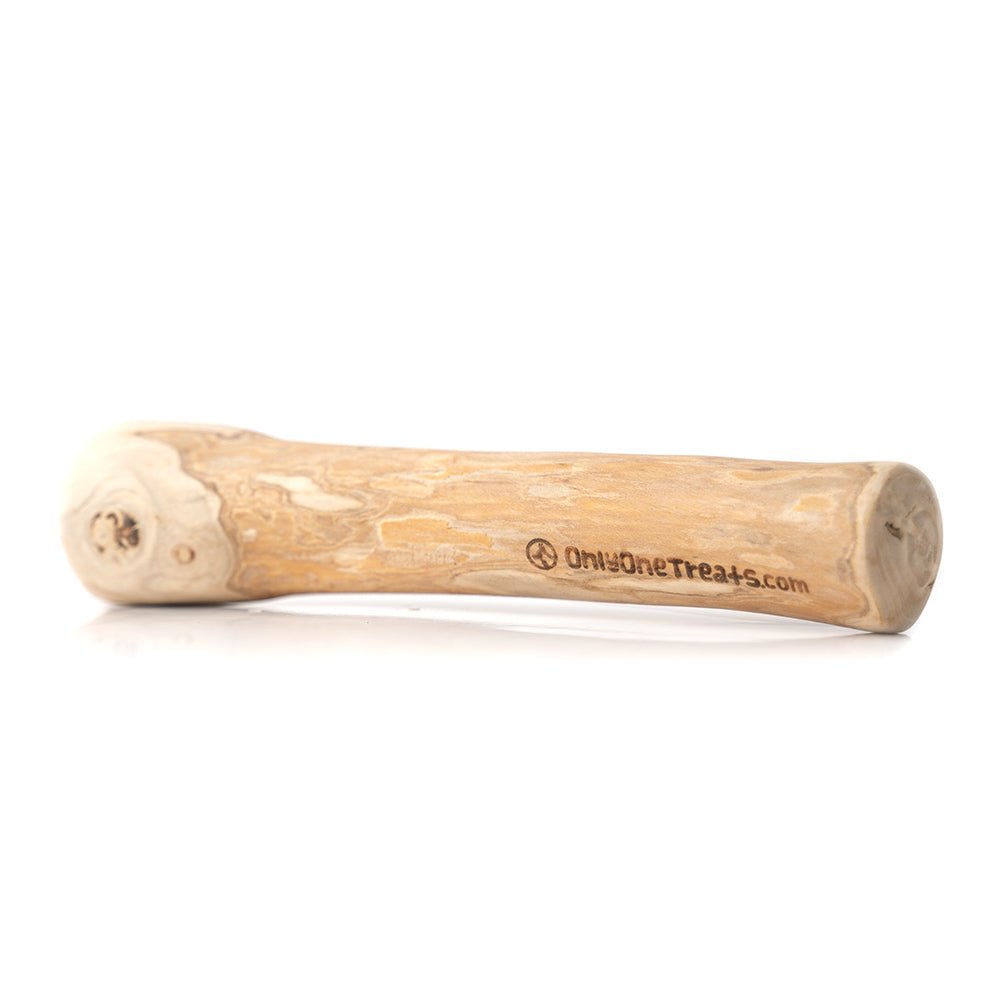 Wooden dog chew toy with 'OnlyOneTreats.com' branding on a white background