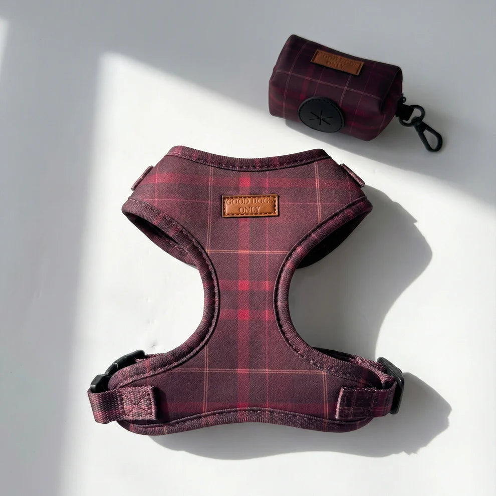 Red plaid dog harness with matching pouch on a white background