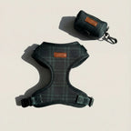 Dog harness and matching pouch on a light beige background