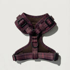 Plaid patterned dog harness on a light gray background