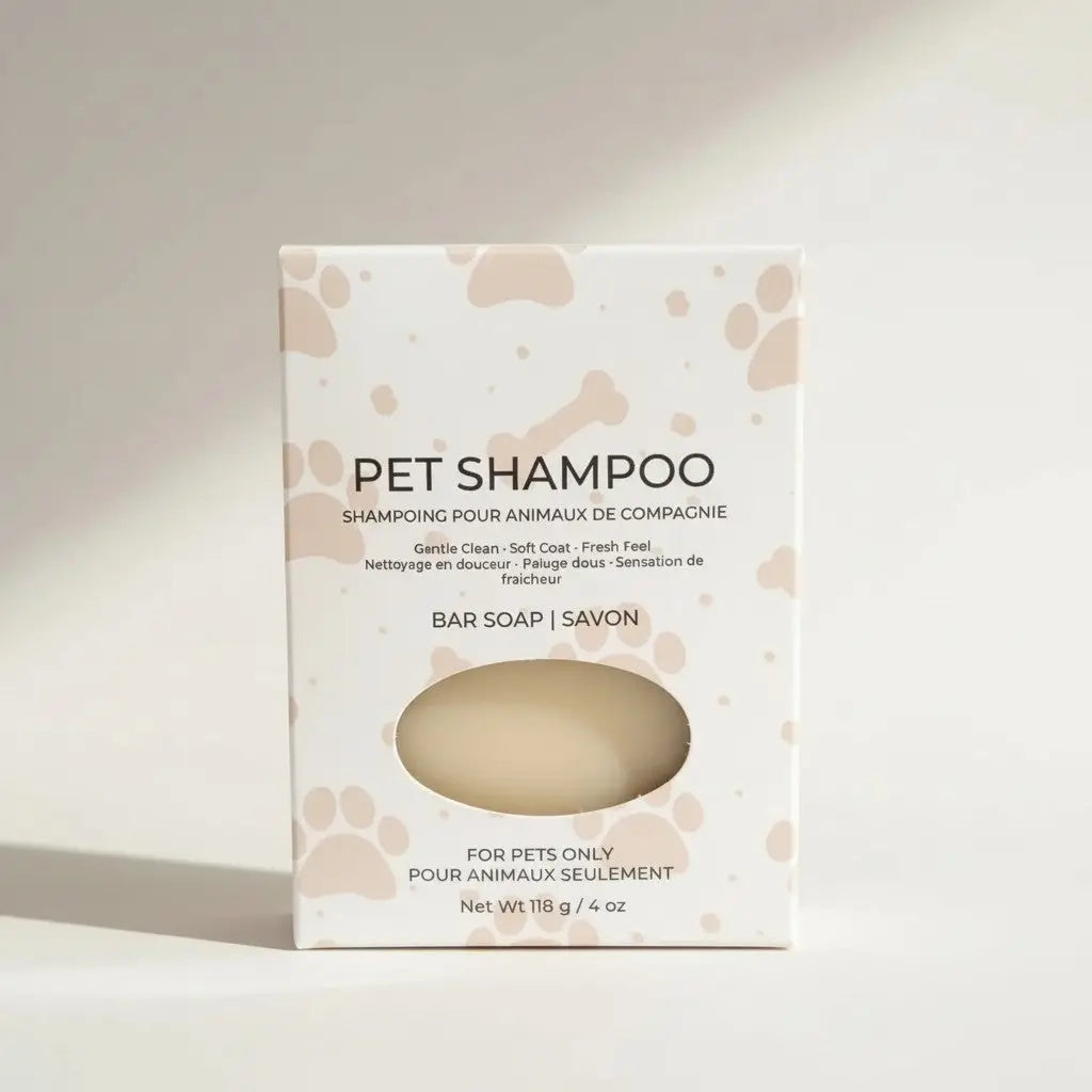 Pet shampoo bar soap packaging with paw prints on a light background