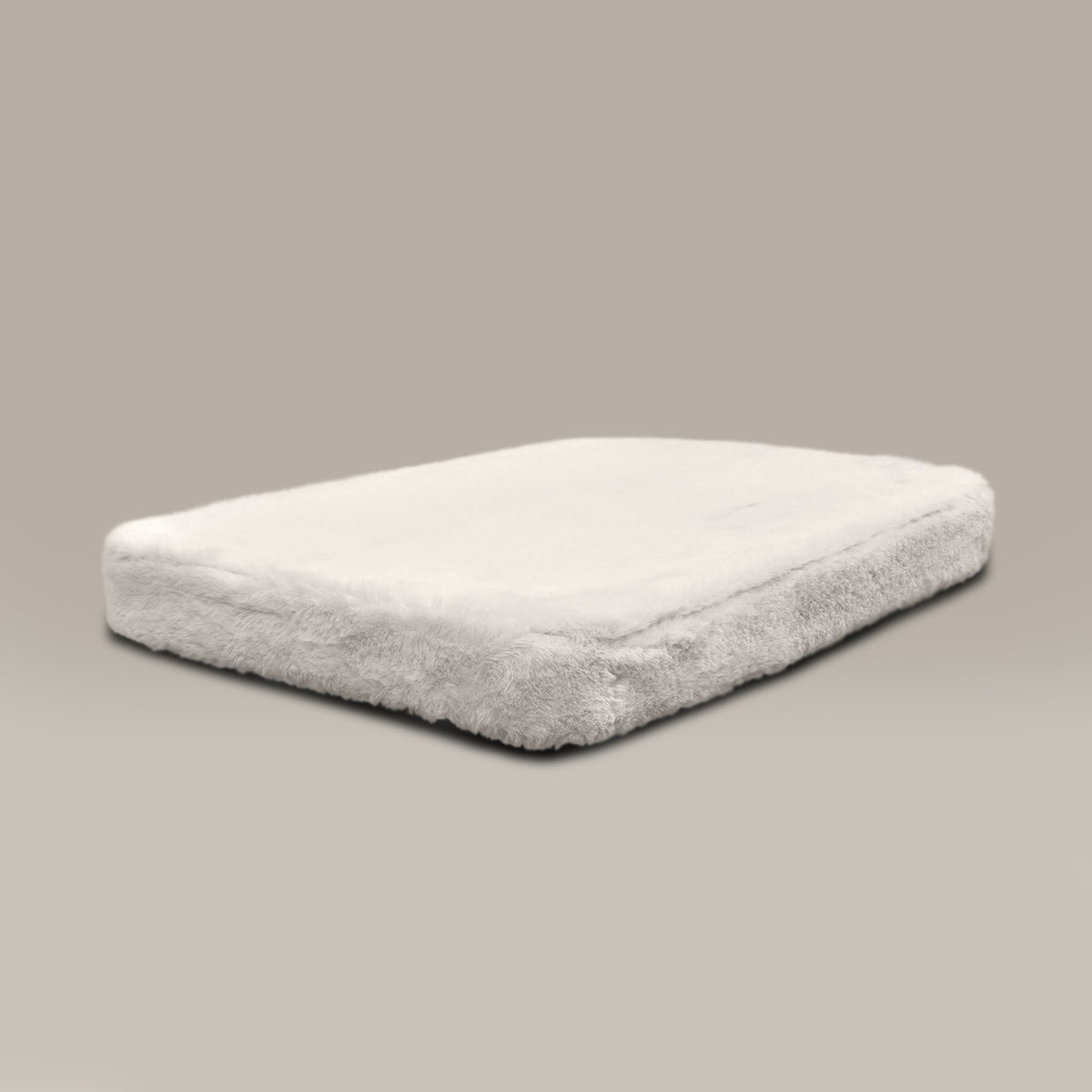 Rectangular gray pet bed on a light gray background