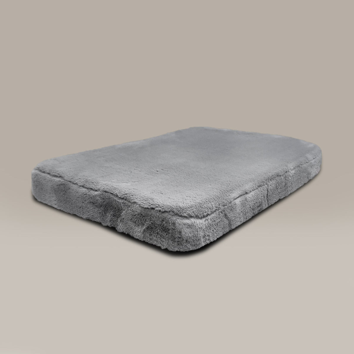 Gray pet bed on a beige background