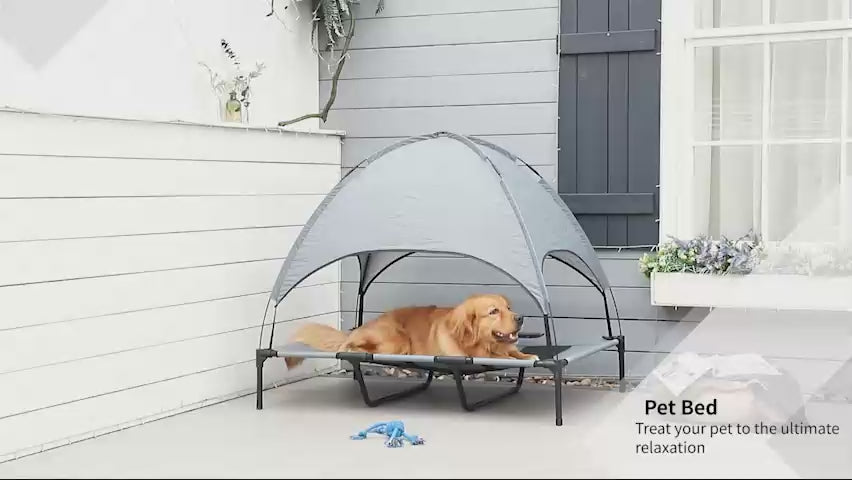 video of a dog using a grey pet canopy cot outdoors