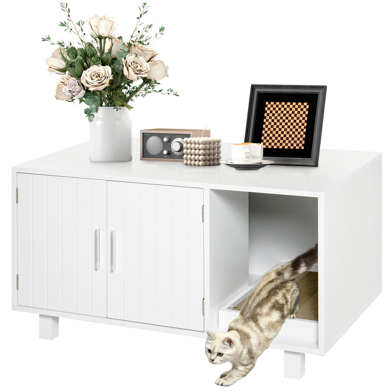 White cat litter enclosure, flowers, and decor items on top.
