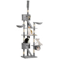 Gray cat tree with multiple levels and a cat sitting on one of the platforms.
