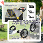 Pet stroller with adjustable canopy and 12-inch rear wheels with brake, set against a blurred outdoor background.