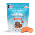 Package of healthybud training treats with salmon slices on a black background