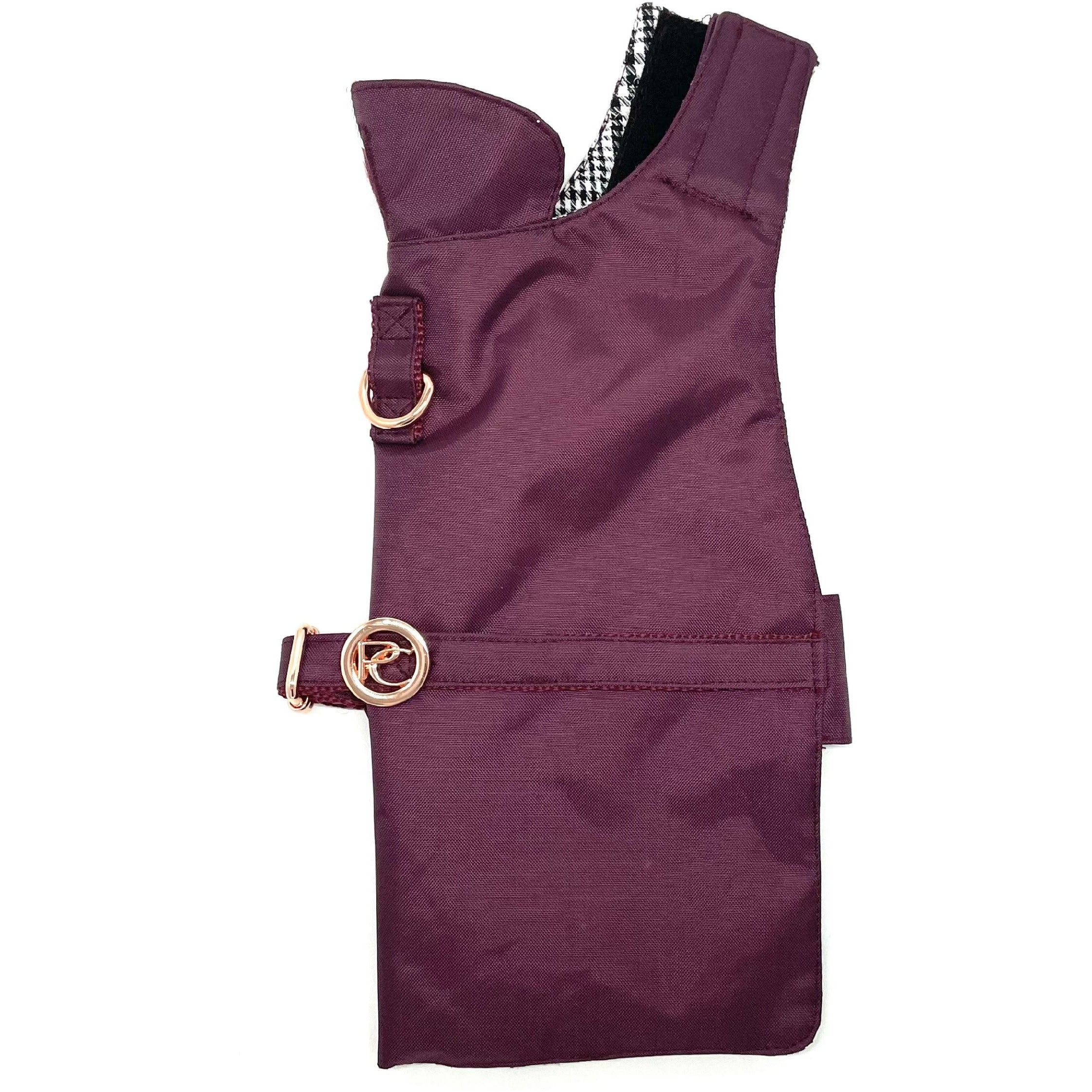 Burgundy dog rain coat with gold buckle on a white background