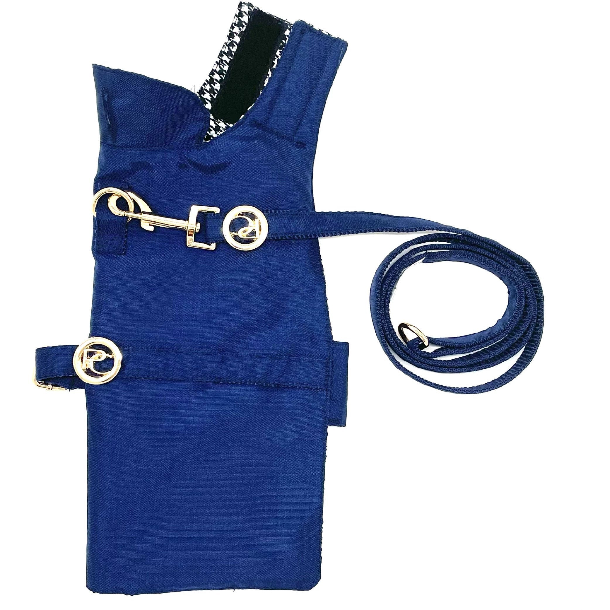 Blue Dog Rain Coat with gold hardware on a white background